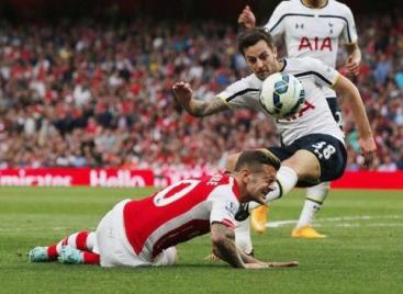 Ryan Mason kicks Wilshere